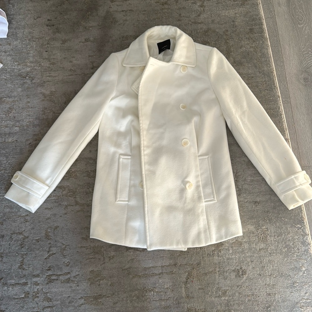 Women’s white Peacoat.